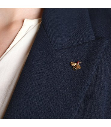 Cartier enamel, ruby and gold brooch