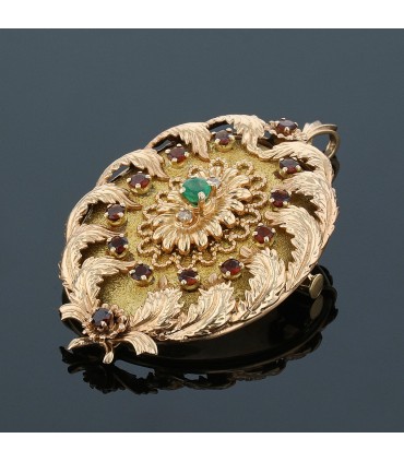 Gold, garnets, emerald and diamond brooch