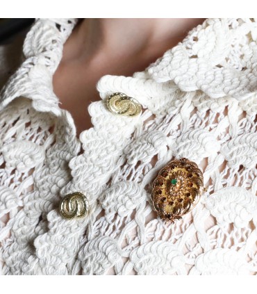 Gold, garnets, emerald and diamond brooch