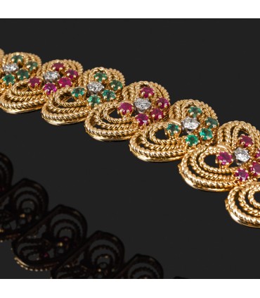 Rubies, emeralds, diamonds and gold bracelet.