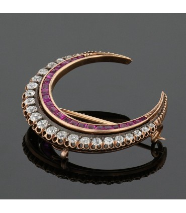 Silver, gold, rubies and diamonds brooch