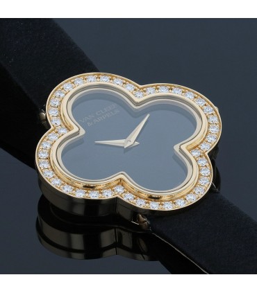 Van Cleef & Arpels Alhambra diamonds, onyx and gold watch