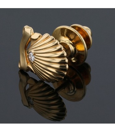 Cartier diamond and gold pin’s