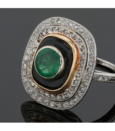 Platinum, emerald, gold, onyx and diamonds ring
