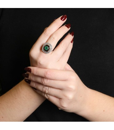 Platinum, emerald, gold, onyx and diamonds ring