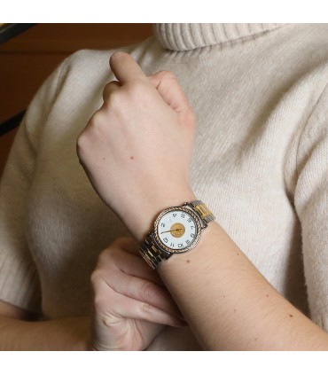 Hermès Sellier gold plated metal and stainless steel watch