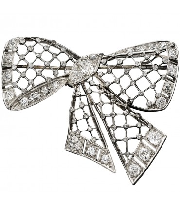 Broche noeud platine et diamants