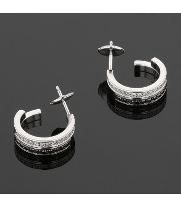 Dinh Van black and white diamonds and gold ring