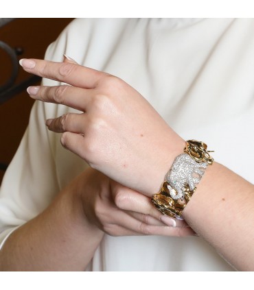 Two tones gold, diamonds and emeralds bracelet