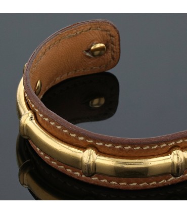 Hermès gold plated metal and leather bracelet