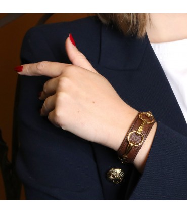 Hermès gold plated metal and leather bracelet