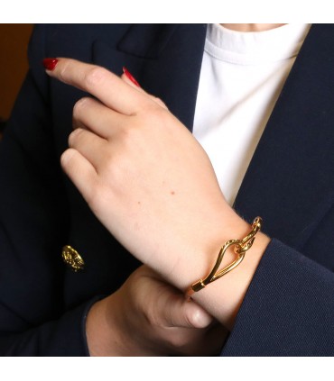 Hermès gold plated metal and leather bracelet
