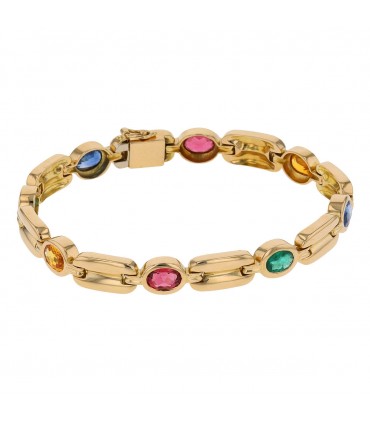 Gold, sapphires, yellow sapphires, pink sapphires and emeralds bracelet