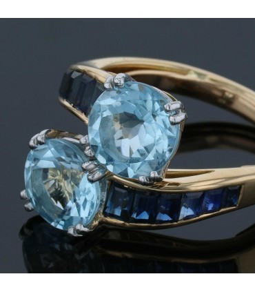 Sapphires, topazes and gold ring