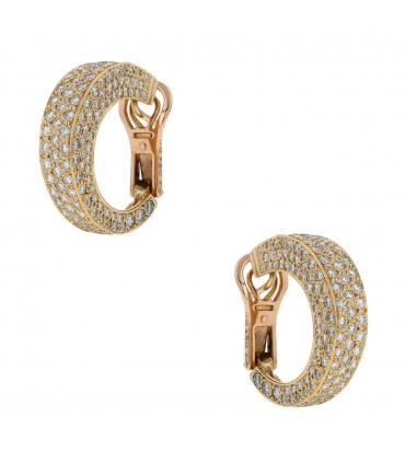 O.J. Perrin Arena diamonds and gold earrings