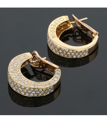 O.J. Perrin Arena diamonds and gold earrings