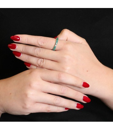 Emeralds, diamonds and gold ring