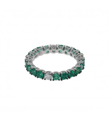 Emeralds, diamonds and gold ring