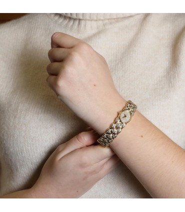 Mauboussin diamonds and gold watch