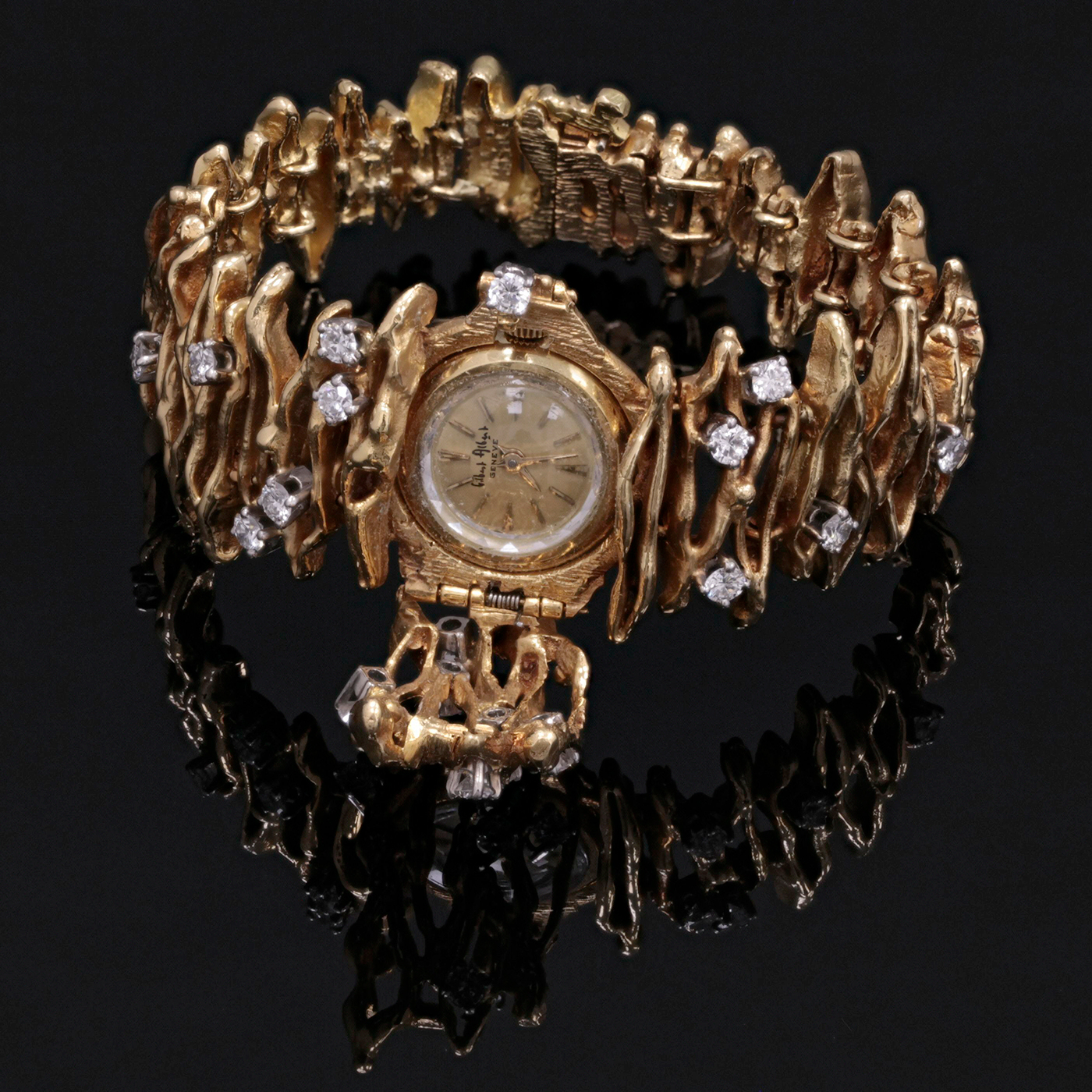 Gilbert Albert diamonds and gold watch